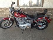   2005 HD Dyna Superglide with 9000 original miles ..